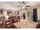Bright living room with travertine flooring offering an open floor plan and backyard access at 1526 E Hazel Dr, Phoenix, AZ 85042