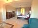 Bright main bedroom showing tray ceilings, a king bed, and large furniture at 1526 E Hazel Dr, Phoenix, AZ 85042