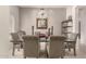 Inviting dining room featuring a glass table and stylish chandelier for elegant dining at 18021 N 53Rd St, Scottsdale, AZ 85254