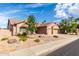 Beautiful home with low maintenance desert landscaping and a three-car garage at 18021 N 53Rd St, Scottsdale, AZ 85254