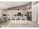 Bright and spacious kitchen with modern appliances, an island with seating, and open layout at 18021 N 53Rd St, Scottsdale, AZ 85254