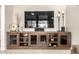 A close up of a built in entertainment center in a living room at 18021 N 53Rd St, Scottsdale, AZ 85254