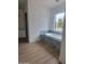 Bathroom features a soaking tub with tile surround and natural light at 18035 E San Tan Blvd, Queen Creek, AZ 85142