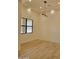 Dining room with modern light fixture and natural light at 18035 E San Tan Blvd, Queen Creek, AZ 85142