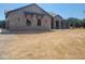 Charming single-story home with brick accents and a spacious yard at 18035 E San Tan Blvd, Queen Creek, AZ 85142
