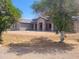 Beautiful home with mature trees in the front yard at 18035 E San Tan Blvd, Queen Creek, AZ 85142