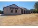 Inviting single-story home featuring brick design with expansive yard space at 18035 E San Tan Blvd, Queen Creek, AZ 85142