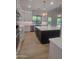 Gorgeous kitchen featuring a large island, pendant lighting, and stainless steel appliances at 18035 E San Tan Blvd, Queen Creek, AZ 85142