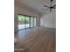 Open living area with sliding glass doors to outdoor living space at 18035 E San Tan Blvd, Queen Creek, AZ 85142