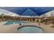 Community pool and spa, with ample seating and shaded areas, perfect for socializing and outdoor enjoyment at 1835 S Rockwell St, Gilbert, AZ 85295