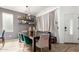 Elegant dining room with stylish decor, pendant lighting, and spacious seating at 1835 S Rockwell St, Gilbert, AZ 85295