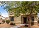 Charming two-story home with a covered porch and lush landscaping at 1835 S Rockwell St, Gilbert, AZ 85295