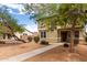 Inviting two-story home with a well-maintained front yard and mature trees at 1835 S Rockwell St, Gilbert, AZ 85295