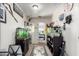Novelty hallway with carpet and a number of decorations and fish tanks at 1835 S Rockwell St, Gilbert, AZ 85295