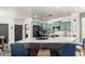Bright eat-in kitchen featuring green cabinets, stainless steel appliances, and a center island at 1835 S Rockwell St, Gilbert, AZ 85295