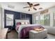 Comfortable main bedroom with a striking accent wall and ample natural light at 1835 S Rockwell St, Gilbert, AZ 85295