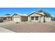 Well-maintained home with desert landscaping, a private drive and an attached garage at 19808 N 3Rd Ave, Phoenix, AZ 85027