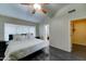 Vaulted ceiling in the primary bedroom with dark floors and a ceiling fan at 19808 N 3Rd Ave, Phoenix, AZ 85027