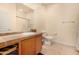 Bathroom features single sink with storage and a toilet at 20750 N 87Th St # 1065, Scottsdale, AZ 85255