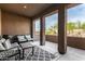 Spacious covered patio with comfortable seating area and peaceful outdoor view at 20750 N 87Th St # 1065, Scottsdale, AZ 85255