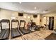 Well-equipped fitness center featuring treadmills, weights, and televisions for entertainment at 20750 N 87Th St # 1065, Scottsdale, AZ 85255