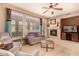 Comfortable living room featuring a fireplace, neutral decor, and ample natural light at 20750 N 87Th St # 1065, Scottsdale, AZ 85255
