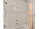 Shower with shower head and patterned curtain at 21759 E Estrella Rd, Queen Creek, AZ 85142
