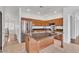 Gourmet kitchen featuring a large island, stainless steel appliances, and tile flooring at 21759 E Estrella Rd, Queen Creek, AZ 85142