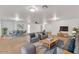 Large living area with a dining table, comfortable seating, and stylish decor at 21759 E Estrella Rd, Queen Creek, AZ 85142