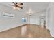 Bright and airy living room with hardwood floors and a view to the front entrance at 21759 E Estrella Rd, Queen Creek, AZ 85142