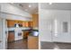 Kitchen features wooden cabinets, white appliances, and plenty of countertop space at 22225 N 29Th Dr, Phoenix, AZ 85027
