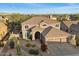Beautiful home with well-maintained desert landscaping, tile roof, and a spacious three-car garage at 22233 N 54Th Way, Phoenix, AZ 85054