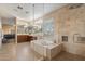 Luxurious bathroom with a soaking tub, walk-in shower, and dual vanities at 22233 N 54Th Way, Phoenix, AZ 85054