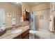 Bathroom featuring granite countertops, single sink vanity, and shower-tub combination at 22233 N 54Th Way, Phoenix, AZ 85054