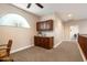Upstairs hallway with a built-in desk area and a view of the staircase at 22233 N 54Th Way, Phoenix, AZ 85054
