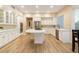 Well-lit kitchen featuring white cabinetry, stainless steel appliances, and ample counter space at 22233 N 54Th Way, Phoenix, AZ 85054