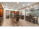 Charming kitchen with stainless steel appliances, wood cabinets, an island and a cozy dining space at 22233 N 54Th Way, Phoenix, AZ 85054