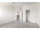 Bedroom with wood grain floors offers nearby closet and direct access to second floor at 2302 S Canfield --, Mesa, AZ 85209