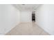 Bright living room with neutral tile flooring and modern recessed lighting at 2302 S Canfield --, Mesa, AZ 85209