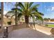 Paved patio showcases a space perfect for outdoor relaxation with views of the neighborhood and blue skies at 2302 S Canfield --, Mesa, AZ 85209
