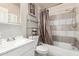 Bathroom with tub and shower combination and tiled walls at 2419 E Billings St, Mesa, AZ 85213
