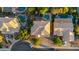Stunning aerial view of the homes, highlighting their roof designs, pools, landscaping, and neighborhood layout at 249 E Palomino Ct, Gilbert, AZ 85296