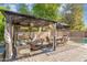 Well-appointed backyard with a gazebo, comfortable seating, dining set, and a pool creating the perfect outdoor retreat at 249 E Palomino Ct, Gilbert, AZ 85296