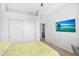 Bedroom features a closet and neutral colors at 249 E Palomino Ct, Gilbert, AZ 85296