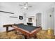 Open game room featuring a pool table and a dartboard in a well-lit space at 249 E Palomino Ct, Gilbert, AZ 85296