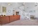Bright, open living room featuring high ceilings and a staircase at 249 E Palomino Ct, Gilbert, AZ 85296