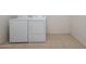 Laundry room equipped with a washer and dryer and tile flooring at 2615 W Silver Streak Way, San Tan Valley, AZ 85144