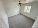 Bright bedroom with a ceiling fan, a window, and neutral walls at 2928 N 37Th Ave, Phoenix, AZ 85019