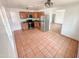 Spacious kitchen with stainless steel appliances, tiled floors, and ample cabinet space at 2928 N 37Th Ave, Phoenix, AZ 85019