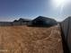 Spacious backyard with block fencing, ready for landscaping, and outdoor activities at 32661 N Newby Dr, San Tan Valley, AZ 85143